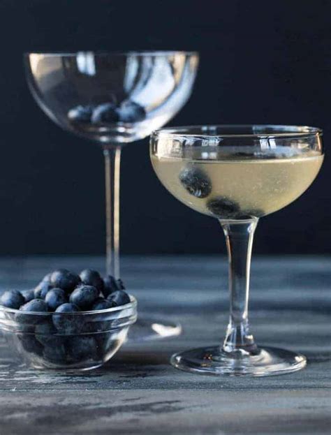 blueberry-martini-recipe-garnish-with-lemon image