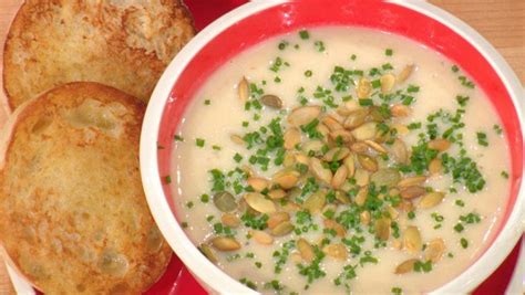 parsnip-and-potato-soup-with-bacon-chives-and-pepitas image