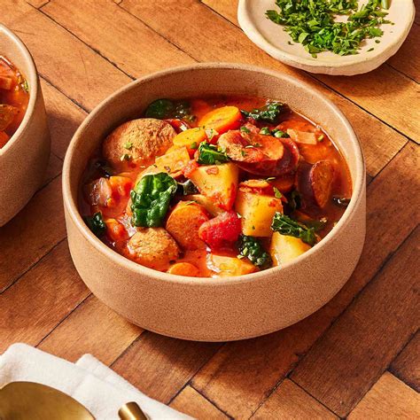 slow-cooker-kale-sausage-stew-eatingwell image