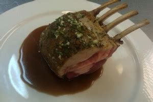 roasted-rack-of-lamb-with-a-rosemary-demi-glace image