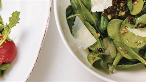 spinach-salad-with-pecorino-pine-nuts-and-currants image