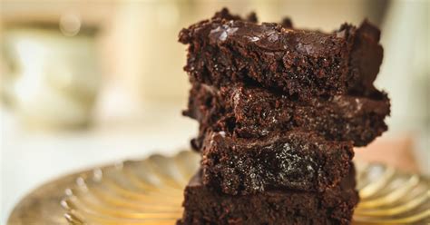 gooey-chocolate-brownies-with-frosting-the image