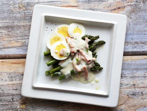 asparagus-with-dijon-cream-sauce-recipe-the-spruce image