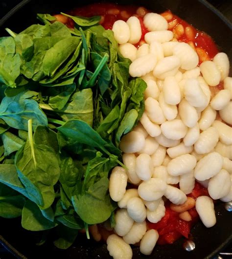gnocchi-with-cannellini-beans-spinach-and-tomatoes image