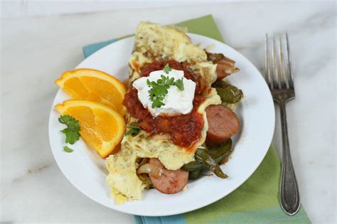 easy-sausage-fajita-omelette-a-farmgirls-kitchen image