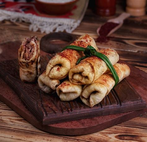 how-to-make-chicken-musakhan-rolls-middle-east-eye image