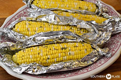 oven-roasted-butter-herb-corn-southern-plate image
