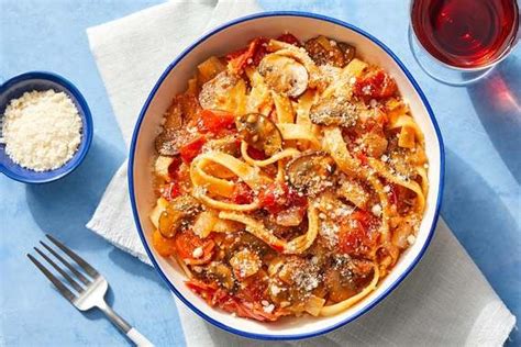 fettuccine-pasta-mushrooms-with-spiced-tomato image