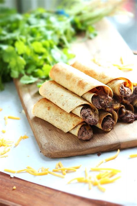 baked-black-bean-and-cheese-taquitos-and-they image
