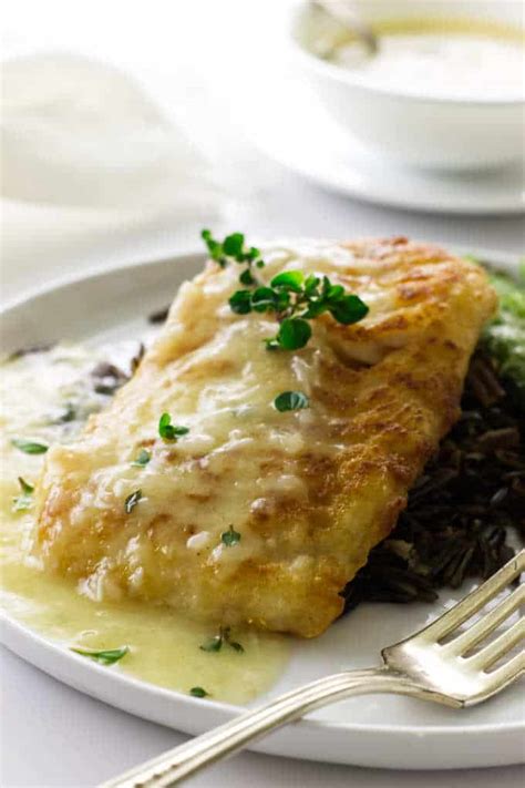 pan-fried-cod-with-lemon-garlic-sauce-savor-the-best image