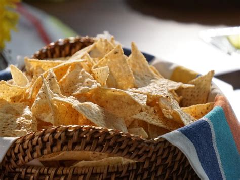 warmed-and-spiced-tortilla-chips-recipe-food-network image
