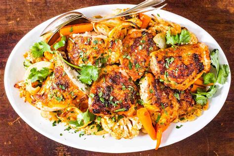 sheet-pan-harissa-chicken-with-carrots-and-cauliflower image