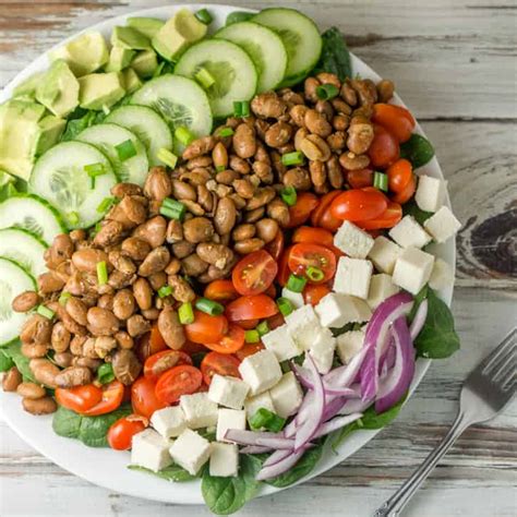 spiced-pinto-bean-salad-with-avocado-crema image