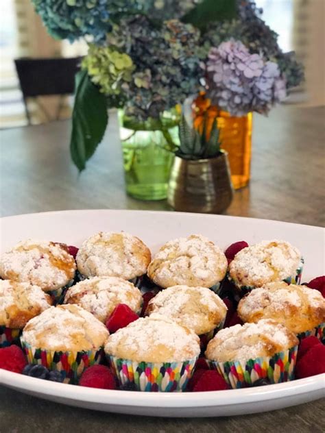 white-chocolate-raspberry-muffins-mom-loves-baking image