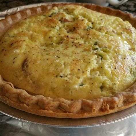 pesto-goat-cheese-and-sun-dried-tomatoes-quiche image