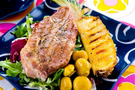 grilled-ham-steak-with-pineapple-recipe-the-spruce image