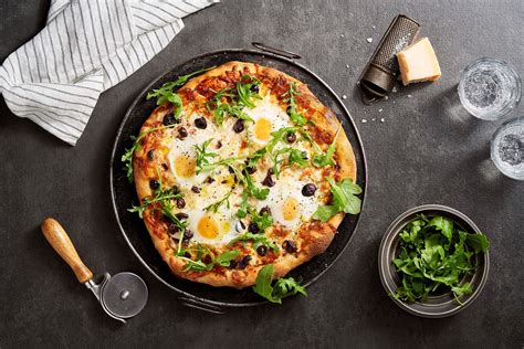 hand-tossed-pizza-with-eggs-get-cracking image