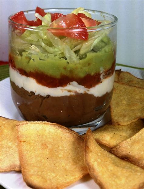 layered-bean-dip-with-corn-chips-single-serving image