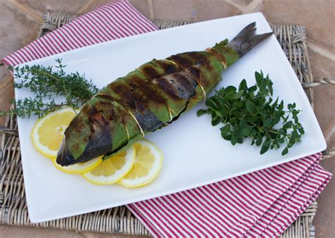 grilled-whole-fish-wrapped-in-grape-leaves-italian-food image