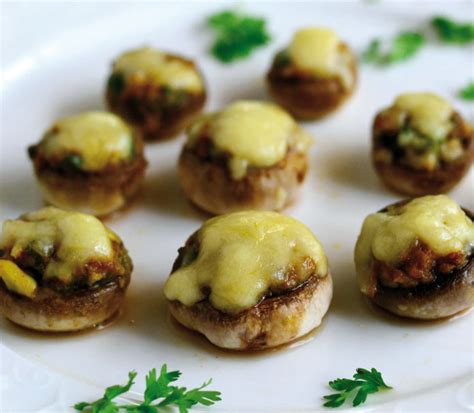 cheese-stuffed-button-mushrooms-complete-wellbeing image