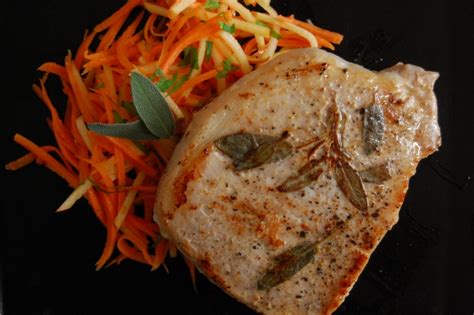 sous-vide-sage-pork-chops-with-carrot-and-apple-slaw image