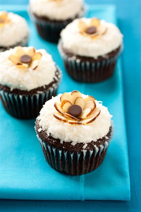 chocolate-cupcakes-with-coconut-frosting-almonds image
