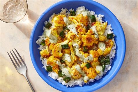 curry-roasted-cauliflower-with-garlic-rice-cilantro image