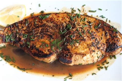 seared-swordfish-with-a-lemon-and-wine-rosemary image