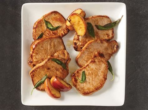 quick-brined-pork-chops-with-apples-hy-vee image
