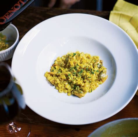 risotto-style-ditalini-with-mussels-clams-and-saffron image