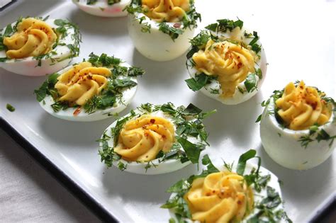 classic-deviled-eggs-with-fresh-herbs-unpeeled-journal image