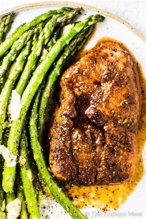 juicy-baked-pork-chops-super-easy-recipe-the-endless-meal image
