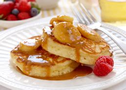 carnation-fluffy-pancakes-with-banana-caramel-sauce image