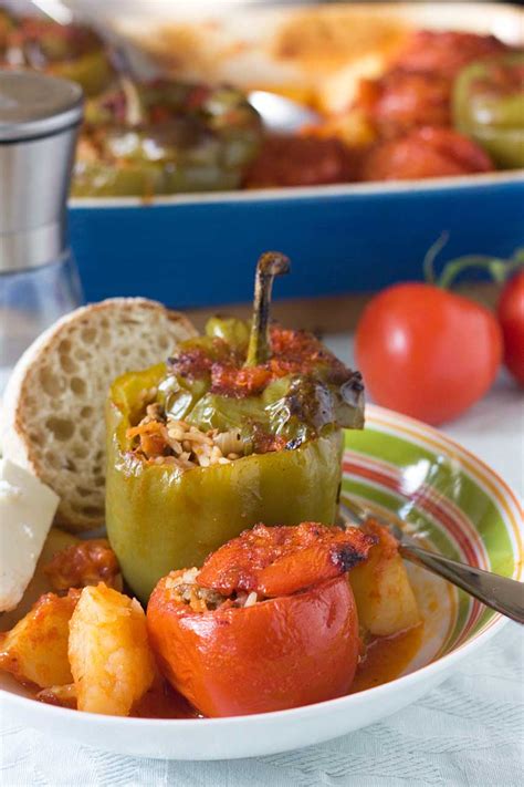 the-tastiest-gemista-greek-stuffed-peppers-and-tomatoes image