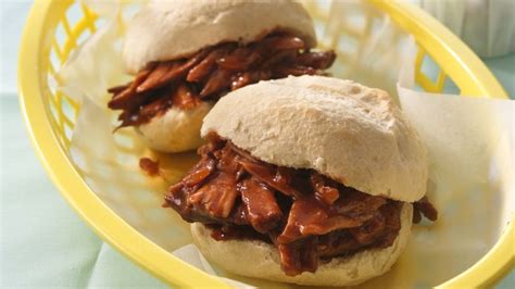 slow-cooked-bbq-pork-sandwiches-on-crusty-rolls image