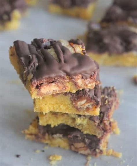 gooey-snickers-cake-bars-easy-dessert-recipe-for-a-party image