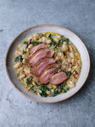 pan-fried-duck-breast-with-creamy-white-beans-jamie image