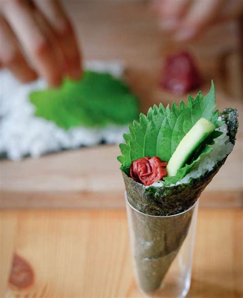 umeboshi-and-cucumber-with-shiso-temaki-japanese image