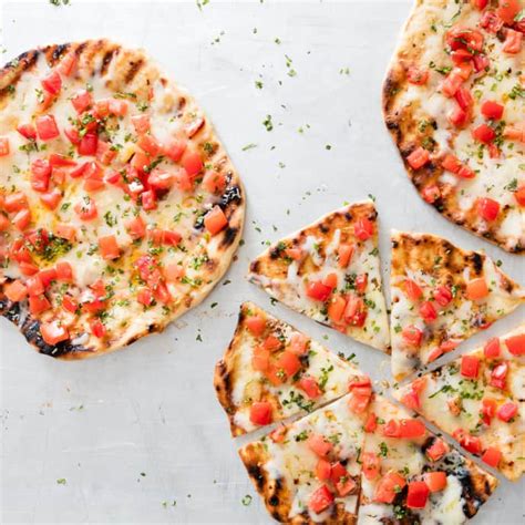 grilled-tomato-and-cheese-pizzas-for-charcoal-grill image