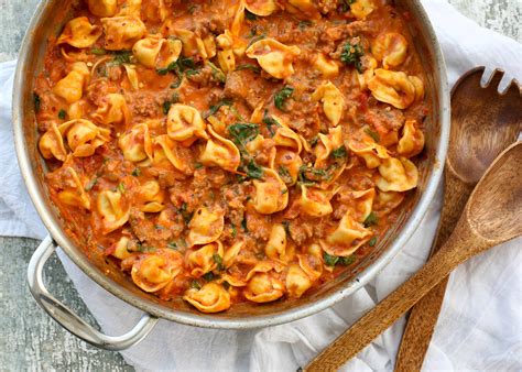 sausage-tortellini-and-spinach-in-a-creamy-tomato-sauce image