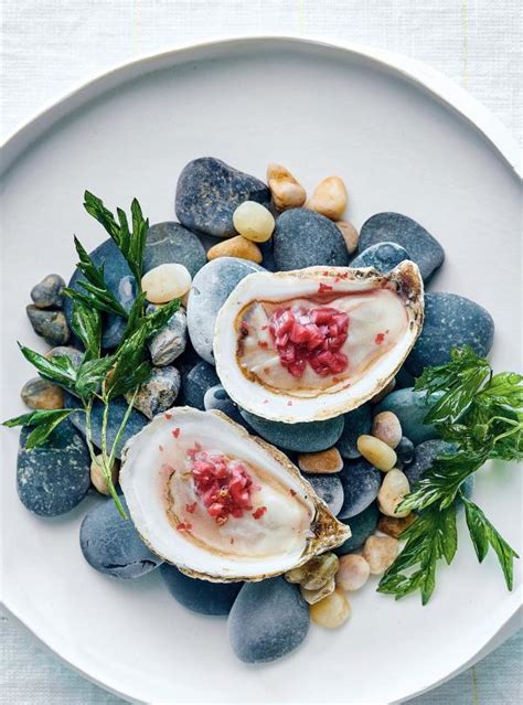 oysters-with-pomegranate-and-pink-pepper-mignonnette image