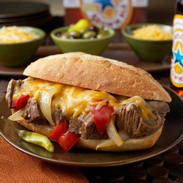 sweet-onion-pepper-beef-sandwiches-with-au-jus image