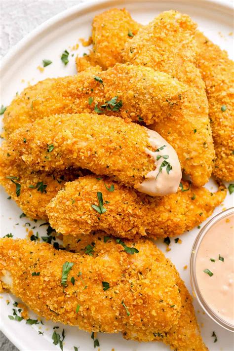 baked-chicken-tenders-crispy-cornflake-crust-easy image