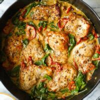 skillet-sun-dried-tomato-chicken-thighs-damn-delicious image