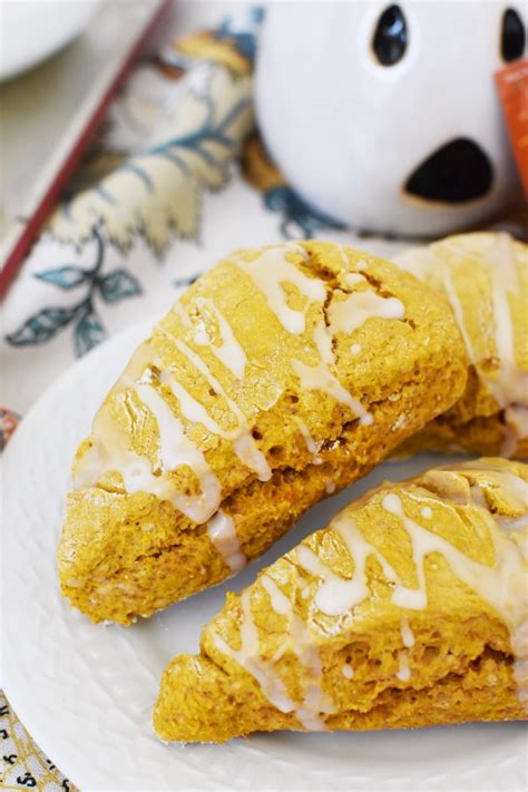 iced-pumpkin-scones-recipe-sizzling-eats image