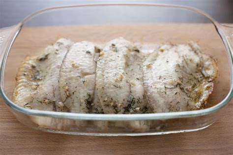 baked-tilapia-recipe-with-garlic-butter-the-spruce-eats image