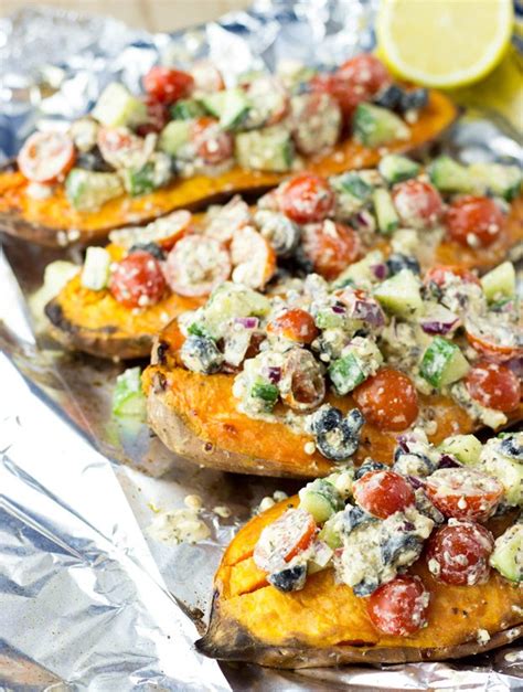 baked-sweet-potatoes-with-a-five-star-feta-salad-delish image