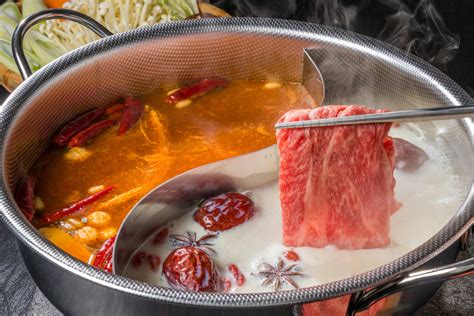white-pork-bone-soup-for-yin-yang-hot-pot-asian image