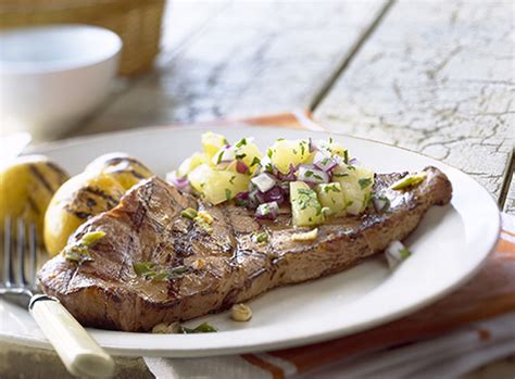 grilled-shoulder-blade-chops-with-pineapple-relish image
