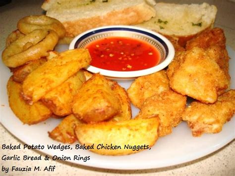 baked-nuggets-potato-wedges-onion-rings image